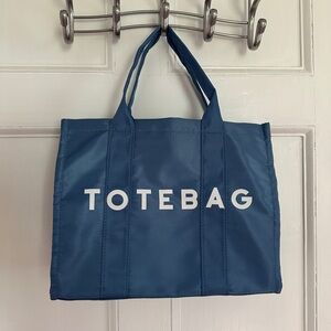 Blue totebag with detachable strap